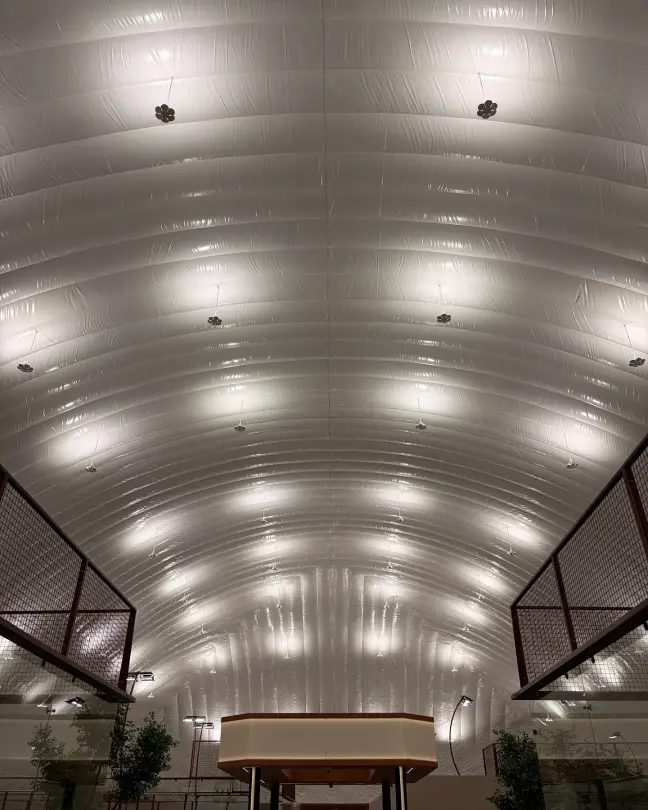 Looking up into the quilted white Airdome ceiling