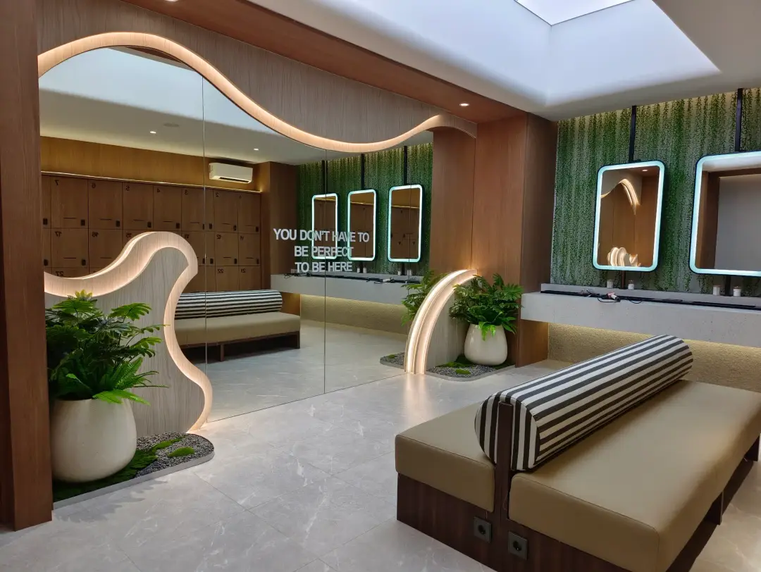 Curved lounge with lit mirrors