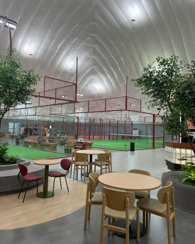 Tables beside the courts