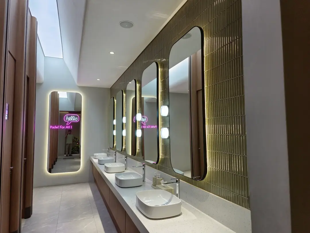 Restroom vanity with round lights